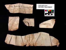 Image of dress patterns made from plain paper and newspaper from the Nether Wallop cache